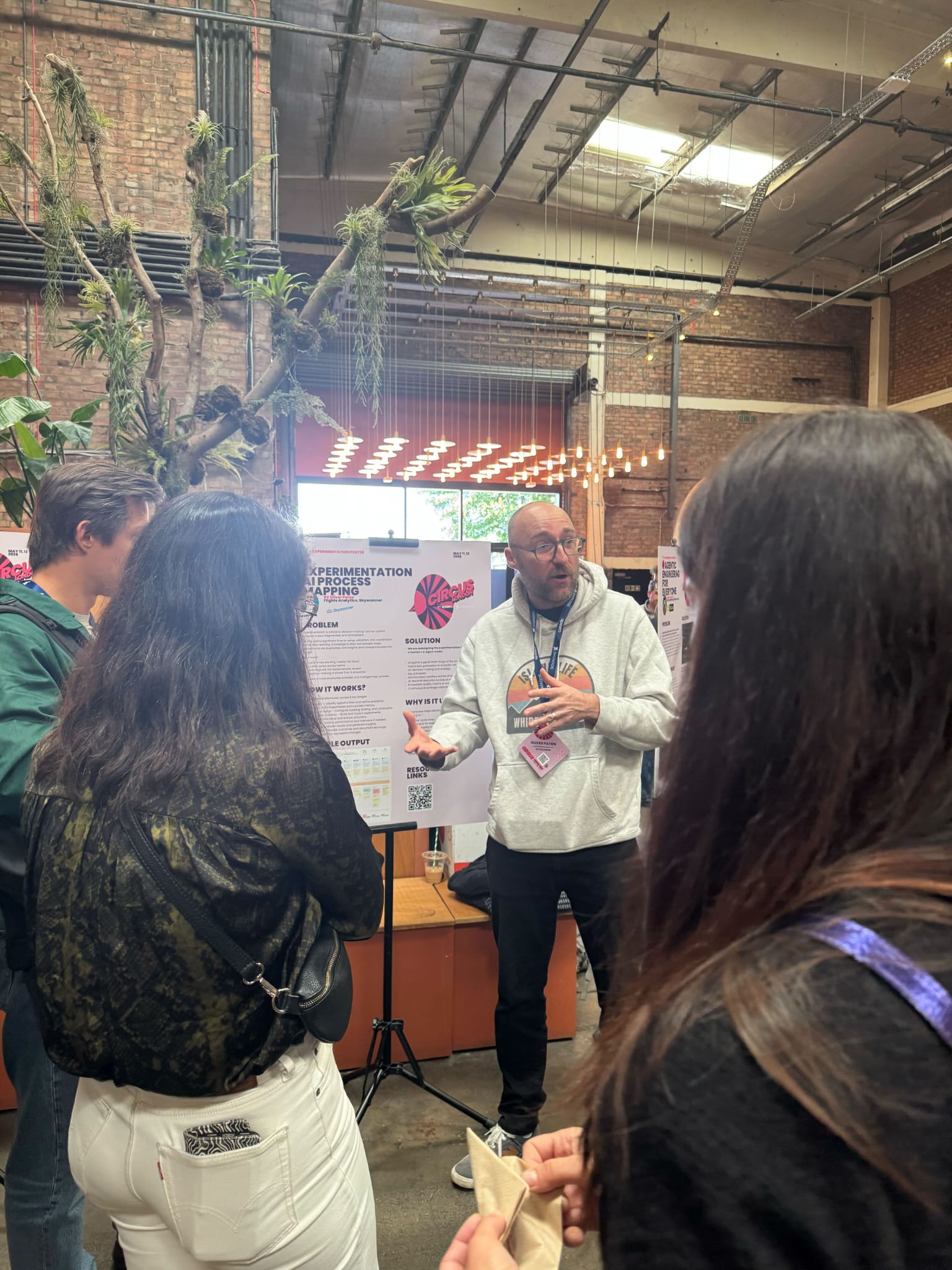 Olly Paton presenting an experimentation process map to a group